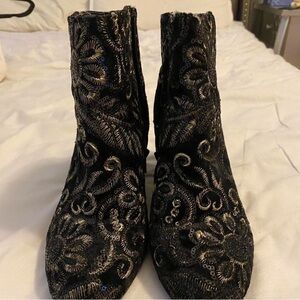 Black and gold booties